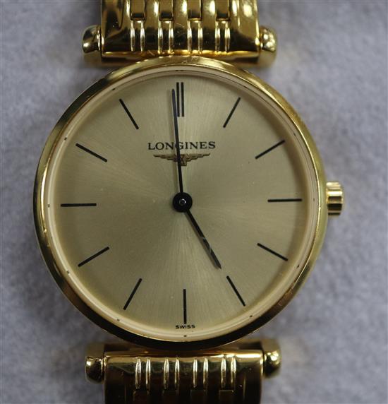 A ladys gold plated and stainless steel La Grande Classique de Longines quartz wrist watch, with box and guarantee.